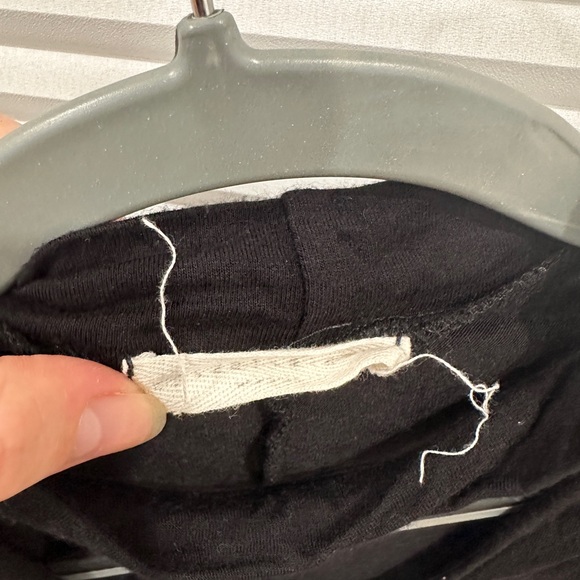 Black long sleeve blouse with cutout. - Picture 4 of 4